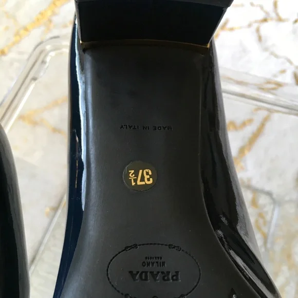 Prada Black and Gold Heels with Elegant Design
